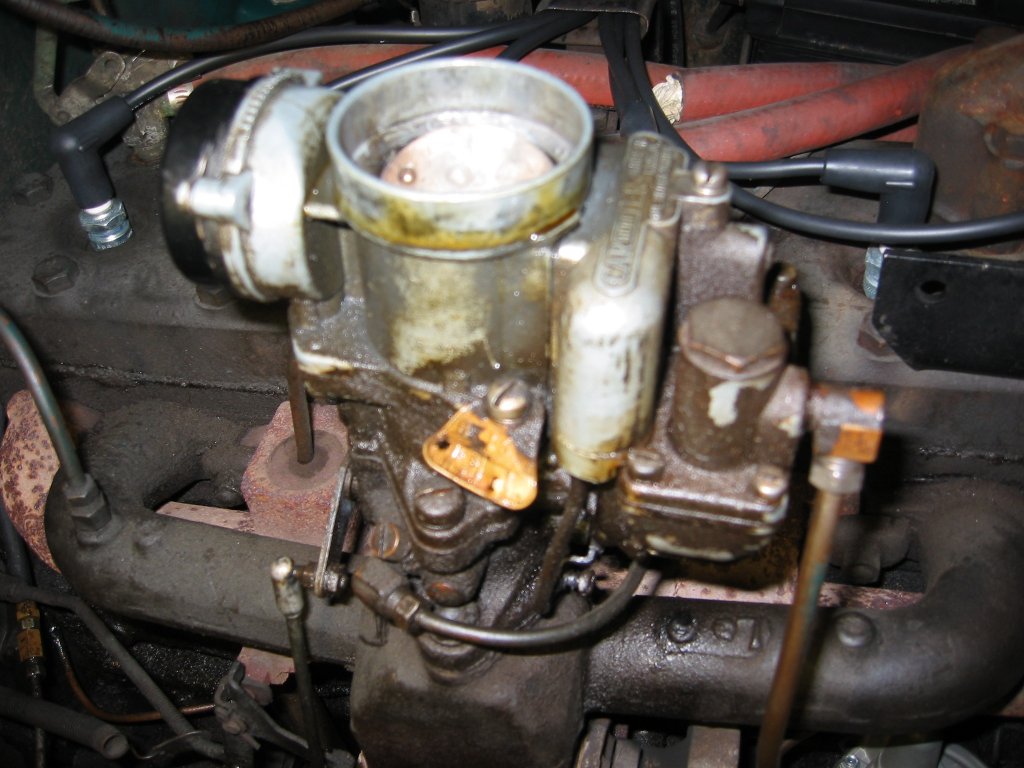 What is involved in a vehicle carburetor rebuild?